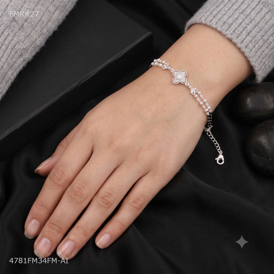 Designer AD Silver Flower with Black Moti Rakhi for man 