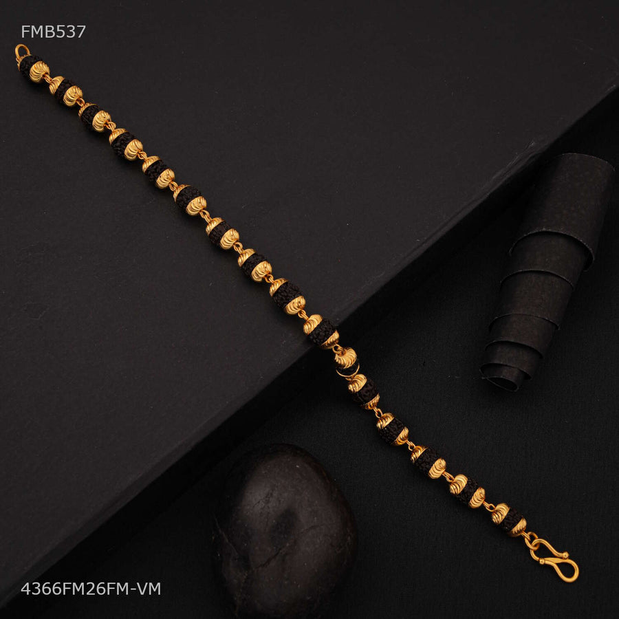 Designer Golden Cap with Black Rudraksha Bracelet For Men - FMB537